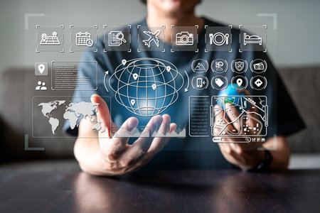 Young man planning vacation trips and searching information or booking hotel on a smart phone, Travel concept with icons and diagramの写真素材