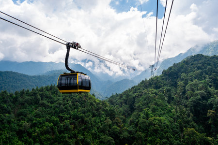 The world's longest electric cable car to Fan Si Pan mountain peak the highest mountain of Indochina with mist over the mountainsの写真素材