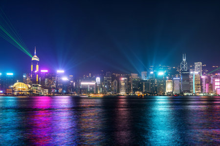 Light and sound show across the Victoria Harbour in Hong Kong at nightの写真素材