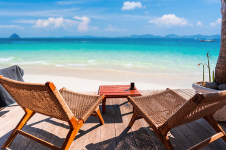 Empty beach chair with tropical beach and sea view, Summer vacation and Travel conceptの写真素材
