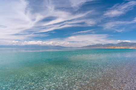 Beautiful sayram lake with blue sky at summer in Xinjiang, Chinaの写真素材