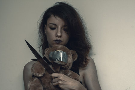 A female demon killing an innocent bearの写真素材