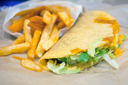 Close up on a taco bell with fries