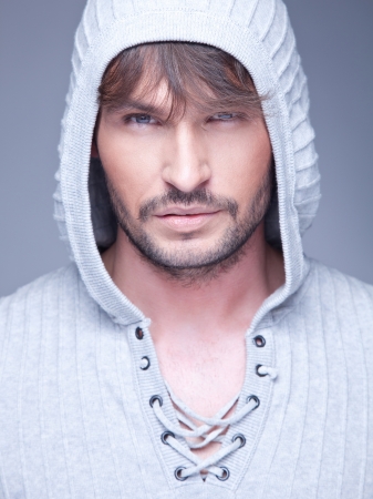 Portrait of handsome guy looking upの写真素材