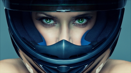 Sexy woman in helmet on blue backgroundの写真素材