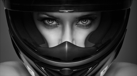 black and white  sexy woman in helmet on the backgroundの写真素材