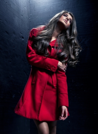 Young woman in a fashion coatの写真素材