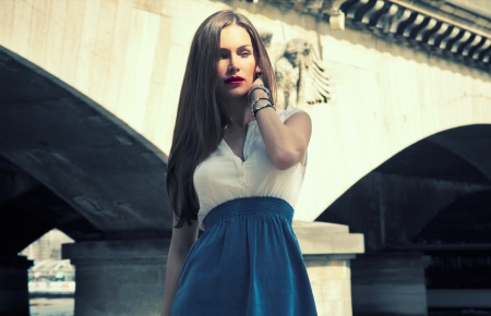 Attractive brunette with sunlight on her face の写真素材