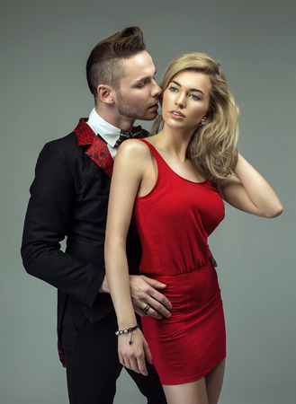 Attractive couple wearing evening dressの写真素材