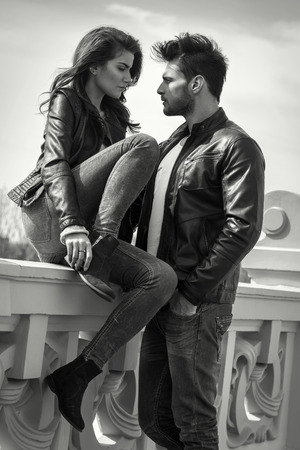 Black and white photo of young fashionable coupleの写真素材
