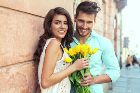 Portrait of couple in love laughing and having fun outdoorの写真素材