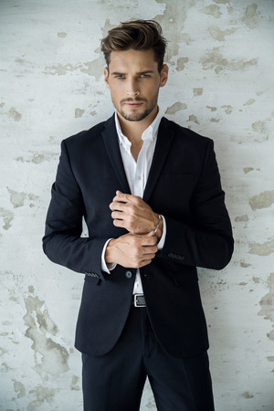 Portrait of sexy man in black suit Portrait of sexy man in black suit