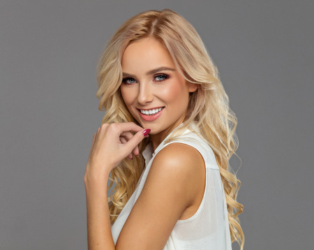 Beautiful blond smiling womanの写真素材