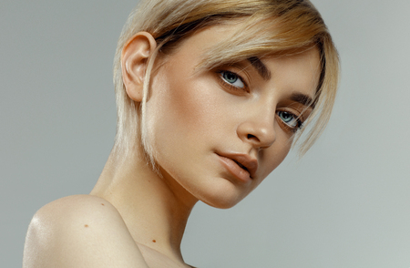 Beauty portrait of fashion female model with natural skinの写真素材