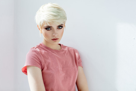 Beauty portrait of fashion blond model in short hairの写真素材