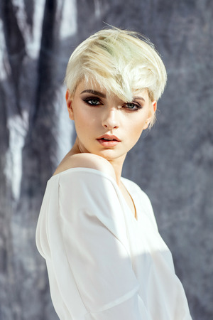 Fashion portrait of female model in short hairの写真素材