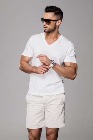 Handsome man in summer clothes wear sunglassesの写真素材