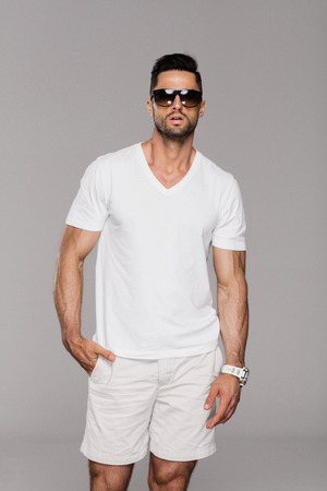 Handsome man in summer clothes wear sunglassesの写真素材