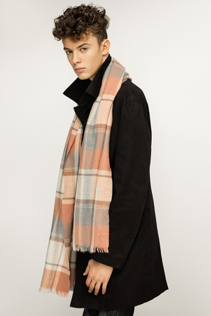 Young fashion boy wearing spring outfitの写真素材