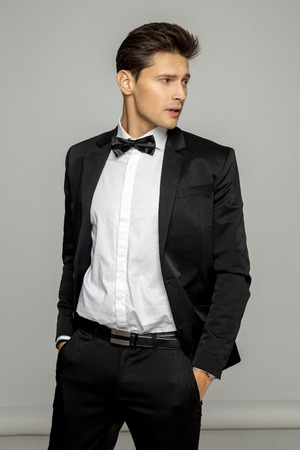 Portrait of handsome man in black suitの写真素材