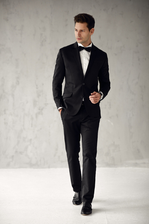 Portrait of handsome man in black suitの写真素材