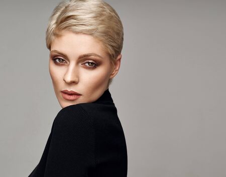 Portrait of sexy blonde in short hair with copy spaceの写真素材