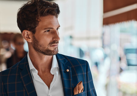 Portrait of handsome man in checked suitの写真素材