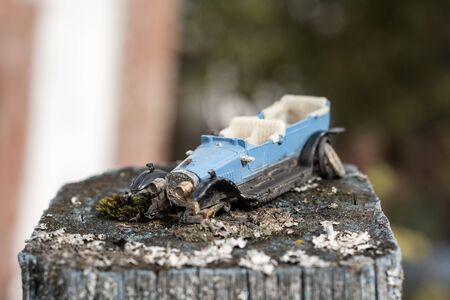 Old children toy in the village on the fenceの写真素材