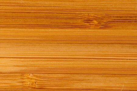 Close up bamboo wooden kitchen cutting board backgroundの写真素材