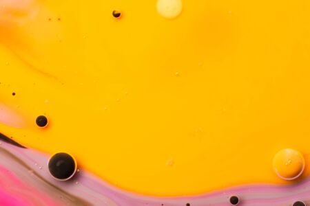 Macro universe, platnets and stars in it, multi-colored paints. Universe in a plate.の写真素材