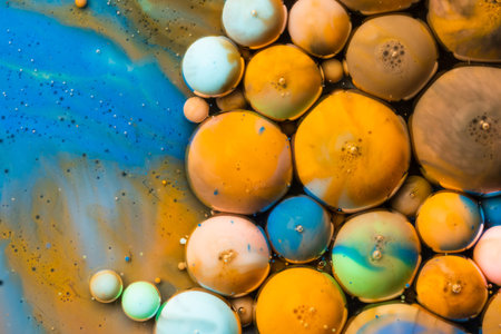 Macro universe, platnets and stars in it, multi-colored paints. Universe in a plate.