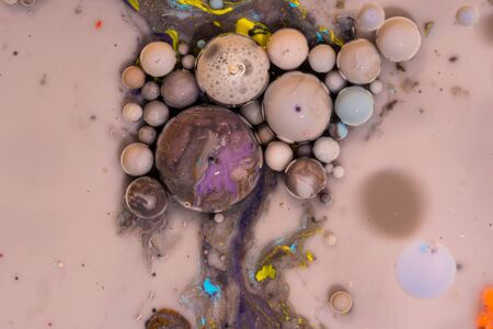 Macro universe, platnets and stars in it, multi-colored paints. Universe in a plate.の写真素材