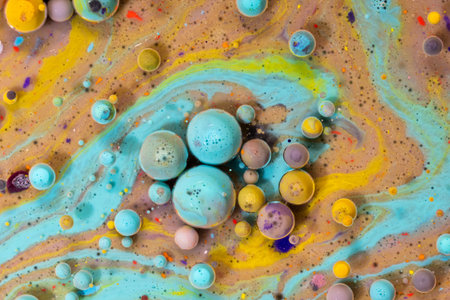 Macro universe, platnets and stars in it, multi-colored paints. Universe in a plate.