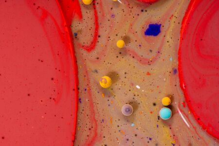 Macro universe, platnets and stars in it, multi-colored paints. Universe in a plate.の写真素材