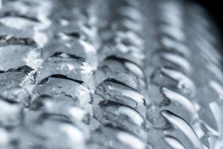 Abstraction and imitation of an iceberg, ice with snow and rain with patterns, macro photoの写真素材