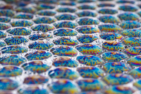 Abstraction soap bubbles. fire on bubbles. Ideal honeycomb shapes. macro.