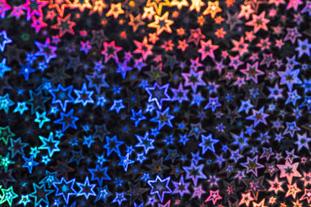 Pearlescent stars shimmer in different shades, starry bokeh, background. Abstraction.の写真素材