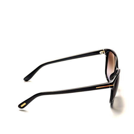 Black, women's sunglasses on a white background.の写真素材