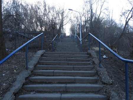 Steps up from the concrete on the street.の写真素材