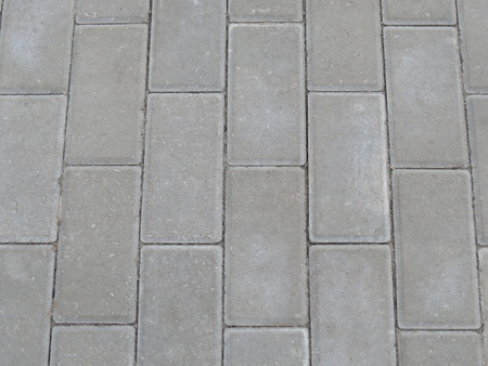 Stone pavers, which are made of the tracks on the street.の写真素材