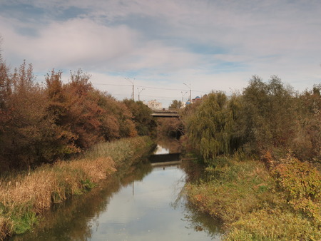 Kharkiv river near the bridge in the autumn.の写真素材
