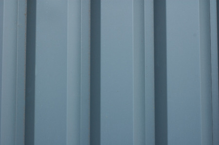 abstract background - gray embossed vertical metal profileの写真素材