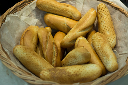 A lot of small bread in the store.