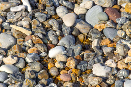 A close up of beach pebble stonesの写真素材