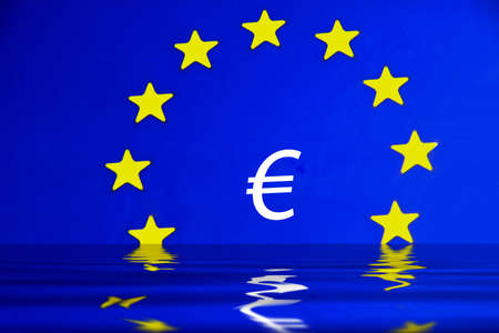EU Flag with water flood in foreground with Euro sign in the middleの写真素材