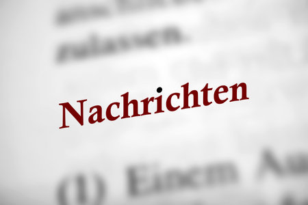 News - Red Letters on White Text Background in Germanの写真素材