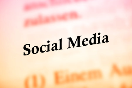 Social Media - black letters on red and yellow backgroundの写真素材