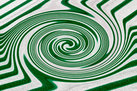 abstract background of green and white stripes in the form of spiralsの写真素材