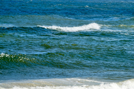 Waves of the North Sea on a sunny day, close-up.の写真素材