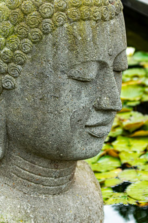 Buddha statue in a Japanese garden in Bangkok, Thailand.の写真素材